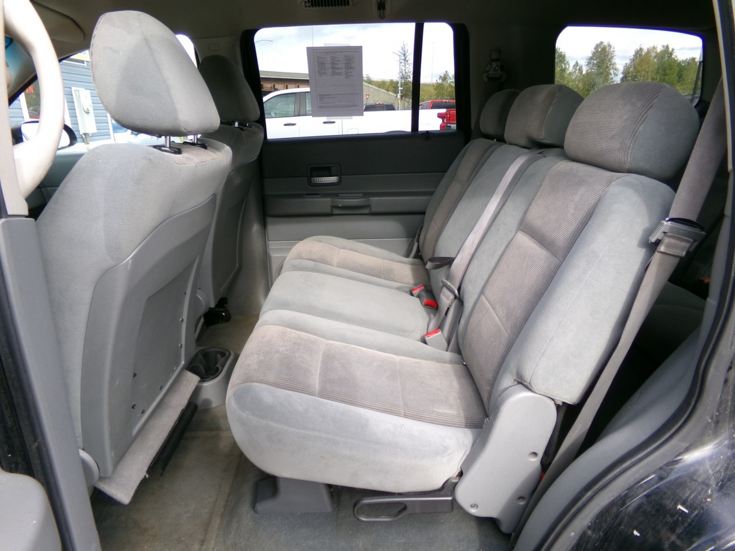 2005 Black Dodge Durango Adventurer Model 4WD (1D4HB48D45F) with an 5.7L V8 OHV 16V engine, 5A OD transmission, located at 2630 Philips Field Rd., Fairbanks, AK, 99709, (907) 458-0593, 64.848068, -147.780609- Photo#5