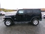 2014 Black Jeep Wrangler Unlimited Sahara 4WD (1C4BJWEG1EL) with an 3.6L V6 DOHC 24V FFV engine, 6-Speed Manual transmission, located at 2630 Philips Field Rd., Fairbanks, AK, 99709, (907) 458-0593, 64.848068, -147.780609- Photo#2