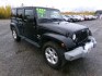 2014 Black Jeep Wrangler Unlimited Sahara 4WD (1C4BJWEG1EL) with an 3.6L V6 DOHC 24V FFV engine, 6-Speed Manual transmission, located at 2630 Philips Field Rd., Fairbanks, AK, 99709, (907) 458-0593, 64.848068, -147.780609- Photo#0