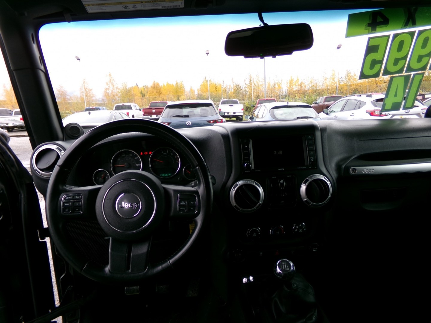 2014 Black Jeep Wrangler Unlimited Sahara 4WD (1C4BJWEG1EL) with an 3.6L V6 DOHC 24V FFV engine, 6-Speed Manual transmission, located at 2630 Philips Field Rd., Fairbanks, AK, 99709, (907) 458-0593, 64.848068, -147.780609- Photo#6