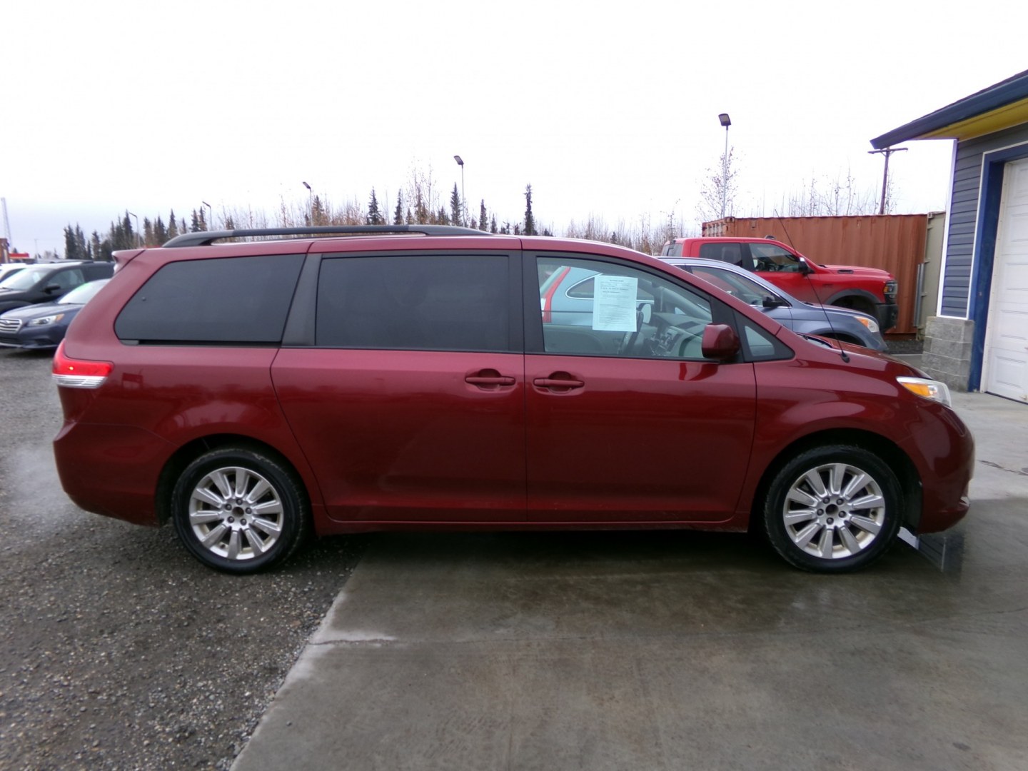 2012 Red Toyota Sienna LE AWD 7-Passenger V6 (5TDJK3DC7CS) with an 3.5L V6 EFI DOHC 24V engine, 5-Speed Automatic transmission, located at 2630 Philips Field Rd., Fairbanks, AK, 99709, (907) 458-0593, 64.848068, -147.780609- Photo#2