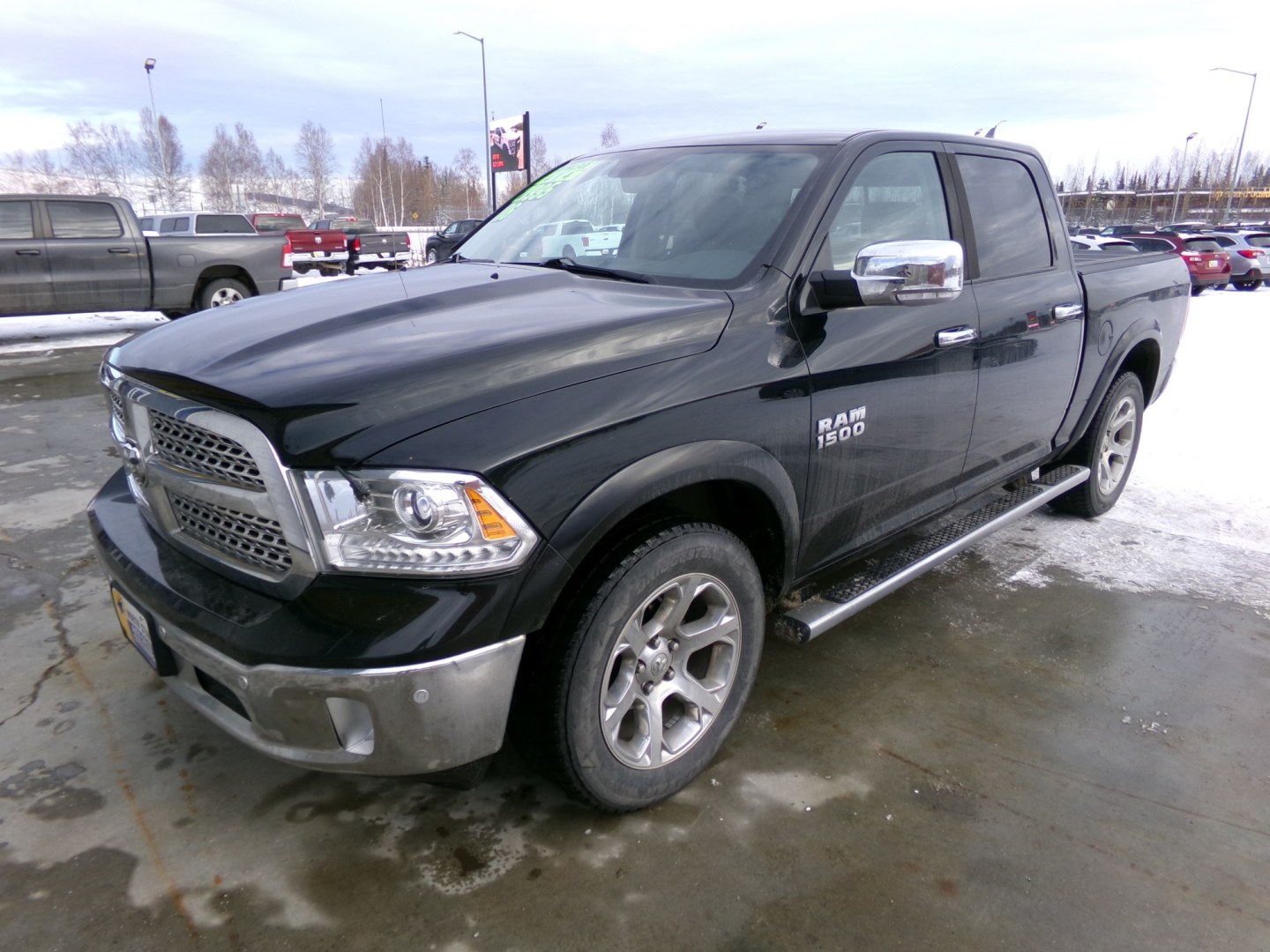 2016 Black Dodge 1500 Laramie Crew Cab SWB 4WD (1C6RR7NGXGS) with an 3.6L V6 DOHC 24V FFV engine, 6A transmission, located at 2630 Philips Field Rd., Fairbanks, AK, 99709, (907) 458-0593, 64.848068, -147.780609- Photo#0